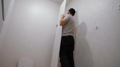 Man Installing Cabinet Video stock 301564977