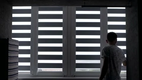 Man installing cassette roller blinds on windows Stock Footage 136215725
