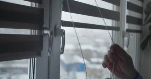 Man installing cassette roller blinds on windows Stock Footage 148433628