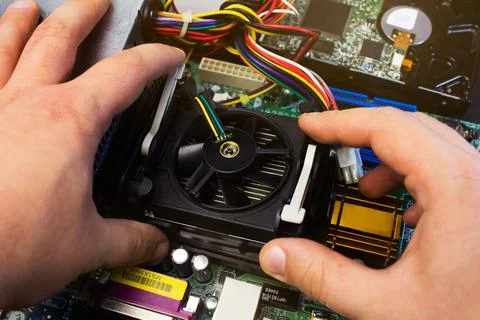 Man installing computer cooler device. Foto stock