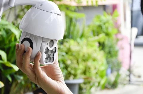 Man installing IP CCTV or high tech surveillance system CCTV system Stock Photos