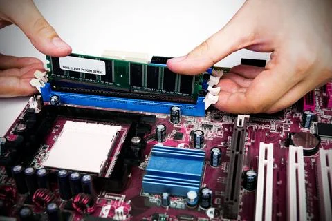 Man installing memory. PC motherboard RAM upgrade 库存照片