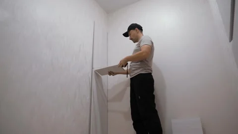 Man Installing Shelf Stock Footage 301564959