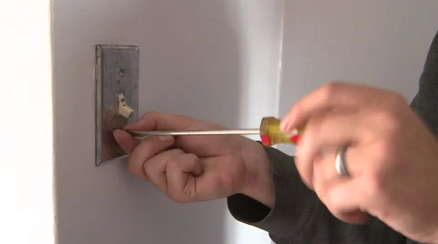 Man installing switch plate Stock-Footage 57713400
