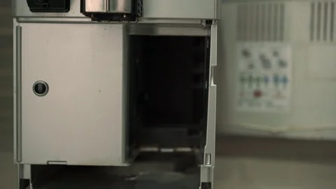 Man installs coffee maker block and removable drip tray Stock Footage 119596829