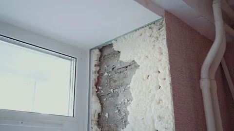 The man installs the windows Stock Footage 81500817