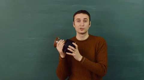 Man instructs how to use the bag valve mask for ventilation resuscitation. Stock Footage 68684362