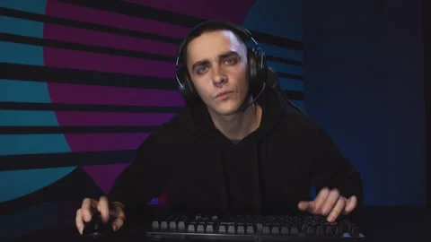 The man is intently playing a computer game Video stock 149324579