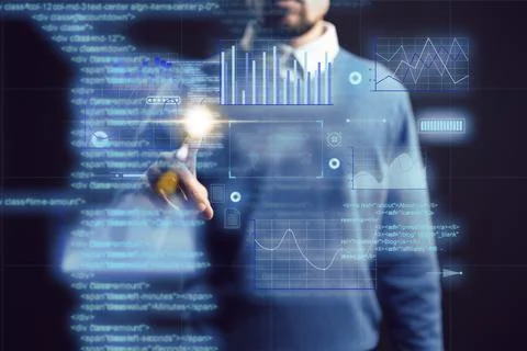 Man interacts with data visualizations and reports on a digital screen in a.. Stock Photos