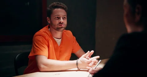 Man, interview and statement in jail for crime, arrest with legal interrogation Stock Footage 277197024