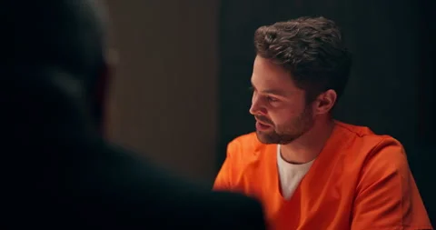 Man, interview and statement in jail for crime, arrest with legal interrogation Stock Footage 277197946