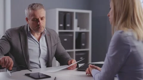 Man interviewing woman at office Stock Footage 314840390