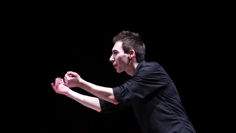 Man Inviting someone on black background Stock Footage 127511672