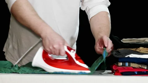 Man Ironing Clothes Stock Footage 85597296