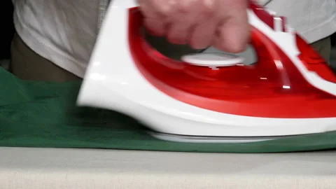 Man Ironing Clothes Stock Footage 85597843