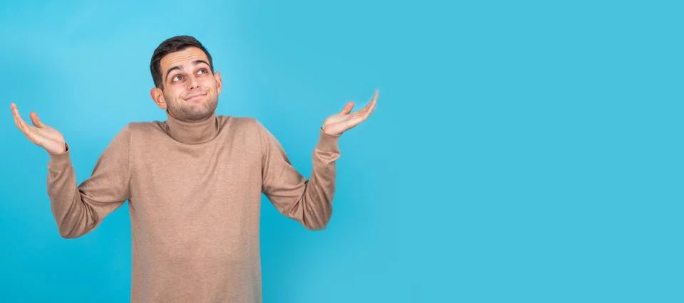 Man isolated on background with expression of misunderstanding Stock Photos