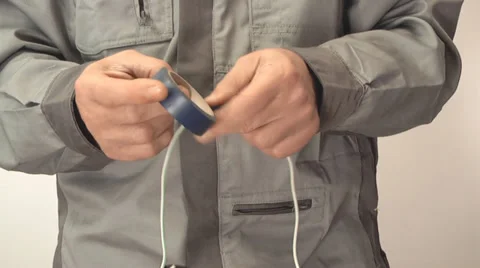 Man isolates electrician wire Stock Footage 39908125
