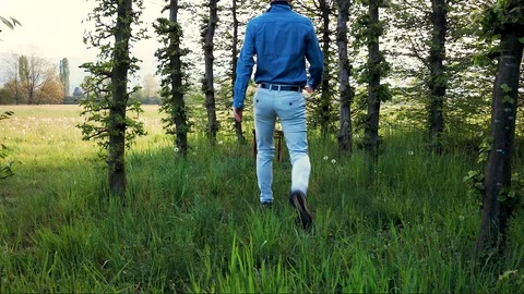 Man Isolation in forest lockdown during Virus Lockdown Stock Footage 129037428