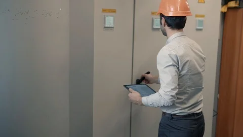 Man IT Engineer In Helmet Working In Server Room.Technical Engineer Working. 库存影片 104199266