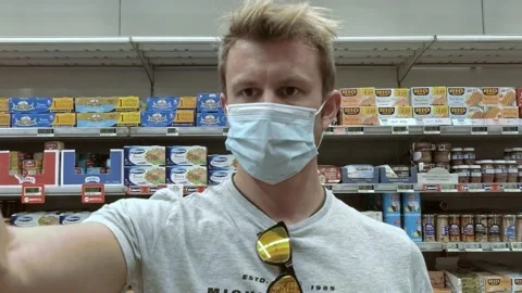 Man at Italian Grocery Store While Wearing a Mask During Covid-19 Pandemic Stock Footage 140926894