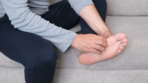 Man itching foot Video stock 288833796