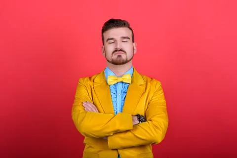 Man in jacket arms folded Stock Photos
