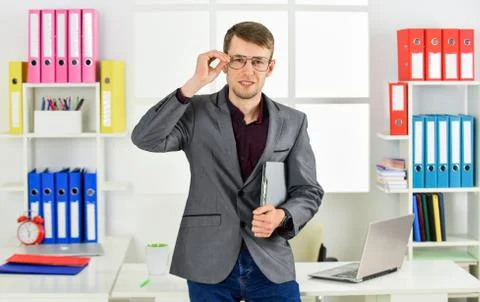 Man in jacket folder successful manager work with documents, according to plan 库存照片