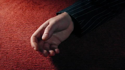 Man In Jacket Knocked Out Or Collapses On Carpet Stock Footage 339100510