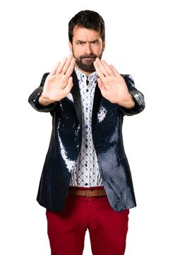 Man with jacket making stop sign Stock Photos