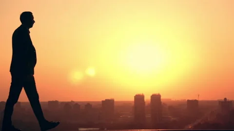 Man in jacket posing at dawn cityscape Stock Footage 140897387