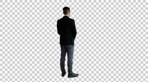 A man in a jacket standing with his back PNG Stock Footage 47261231