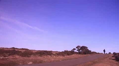 Man in jacket walking country path 2 Stock Footage 47779492