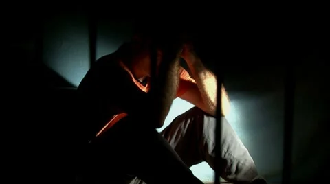 Man in jail, prison bars (take 1) - front left Video stock 7758404