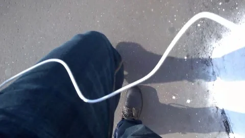 Man in jeans comes down the stairs. First-person view 스톡 동영상 100460026