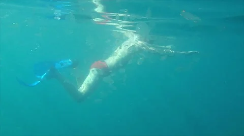 Man in jellyfish water Stock Footage 49080733