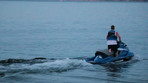Man on Jet Ski at Dusk Stock Footage 40300983