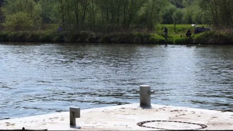 Man on a jet ski passes quickly ride on river, waves on the water. Waves from wa Stock-Footage 130274223