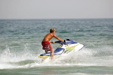 Man on jetski Stock Photos