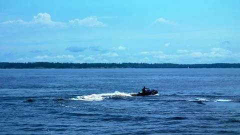 Man on jetski running on the water Stock Footage 82469984