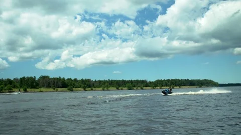 Man on jetski running on the water Stock Footage 82470697