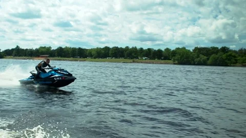 Man on jetski running on the water Stock-Footage 82470800