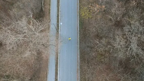 Man jogging from above Stock Footage 98579898
