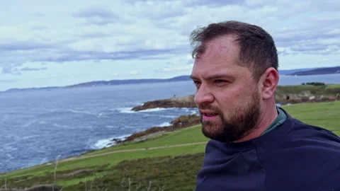 Man Jogging and Recording Himself with Smartphone Outdoors Stock Footage 274942926