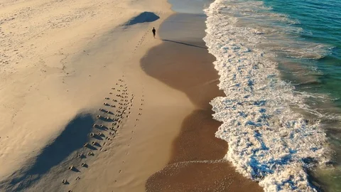Man Jogging on Beach Stock Footage 116242051