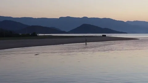 Man Jogging on the beach - Parati - Rio de janeiro Stock Footage 83866405