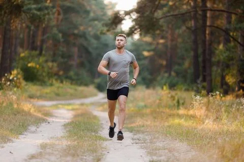 Man jogging at forest Foto stock