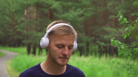 Man jogging with headphones. Stock Footage 221398445