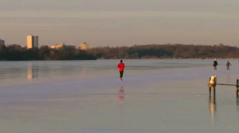 Man jogging on ice Stock Footage 321900