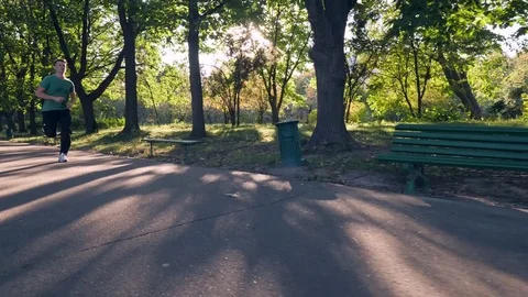 Man jogging in park Video stock 82062929