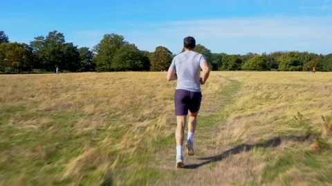 Man Jogging, Running Away from Camera 4K Stock Footage 96047908